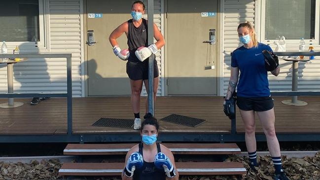 Alex Saundry with Maddy Prespakis and Tayla Harris work out while in quarantine at Howard Springs. Picture: Alex Saundry