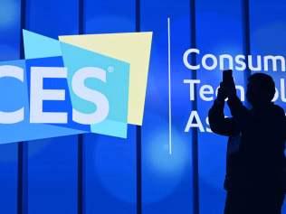 An attendee photographs a sign next to the CES logo ahead of the first keynote address at the 2020 Consumer Electronics Show (CES) in Las Vegas, Nevada. Picture: AFP