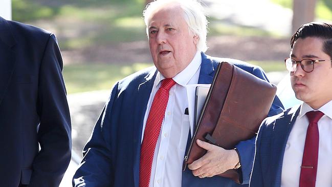 Clive Palmer arrives at the District Court in Brisbane. Picture; AAP.