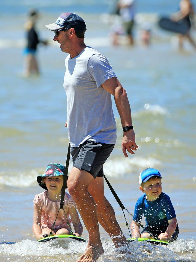 Families enjoy the weather at Torquay. Picture: Mark Stewart