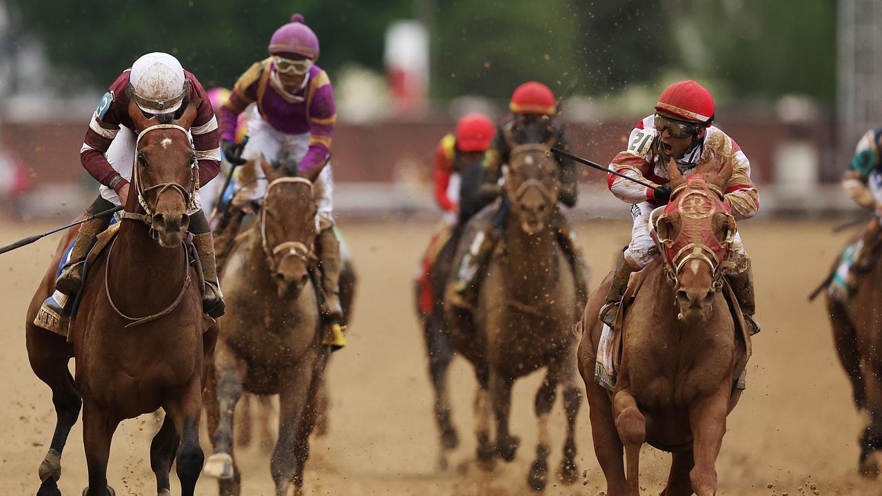 Rich Strike (R) with Sonny Leon up wins the 148th running of the Kentucky Derby at Churchill Downs on May 07, 2022 in Louisville, Kentucky. Photo: Getty Images