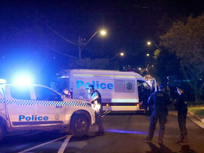 Police pictured at a crime scene on Western Street in Revesby where the shooting happened. Picture: Damian Shaw