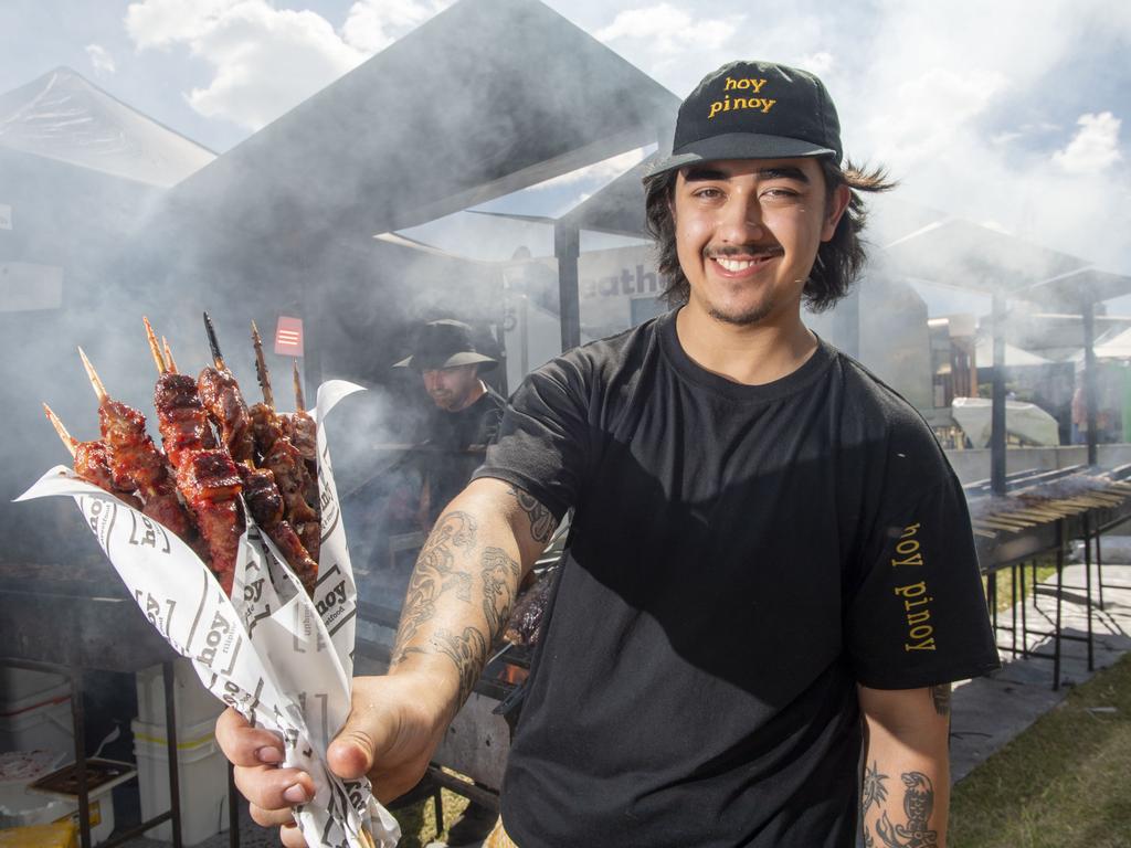 Joshua Meehan from Hoy Pinoy with skewers, one of many vendors offering succulent meat options at MeatStock. Meatstock 2023 at Toowoomba Showgrounds. Friday, April 14, 2023. Picture: Nev Madsen.