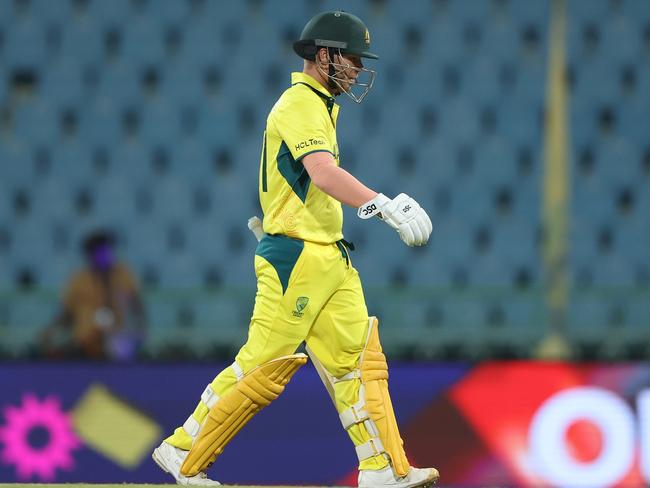 David Warner walks off the ground after being dismissed. Picture: Robert Cianflone/Getty Images