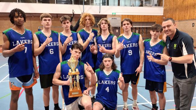 Lake Ginninderra College's boys basketball team that won the 2022 ACT Intercollege Championships, Cameron Pender (trophy front left). Photo: supplied.