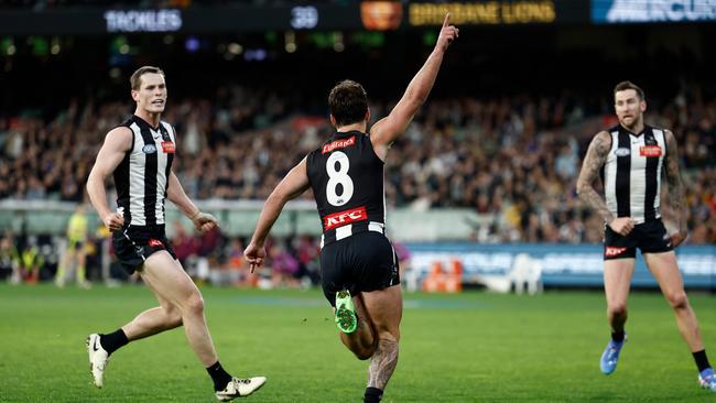 Lachie Schultz of the Magpies celebrates