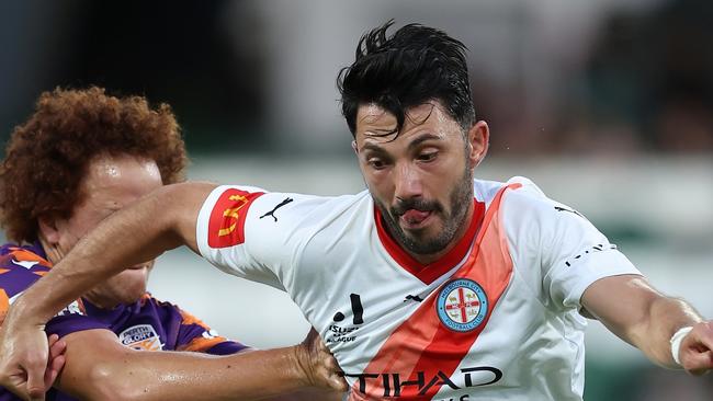 PERTH, AUSTRALIA - FEBRUARY 02: Tolgay Arslan of Melbourne City controls the ball against Mustafa Amini of the Glory during the A-League Men round 15 match between Perth Glory and Melbourne City at HBF Park, on February 02, 2024, in Perth, Australia. (Photo by Paul Kane/Getty Images)