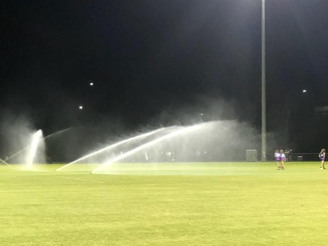 Sprinklers go on at Seaford ground during NAB League Girls match