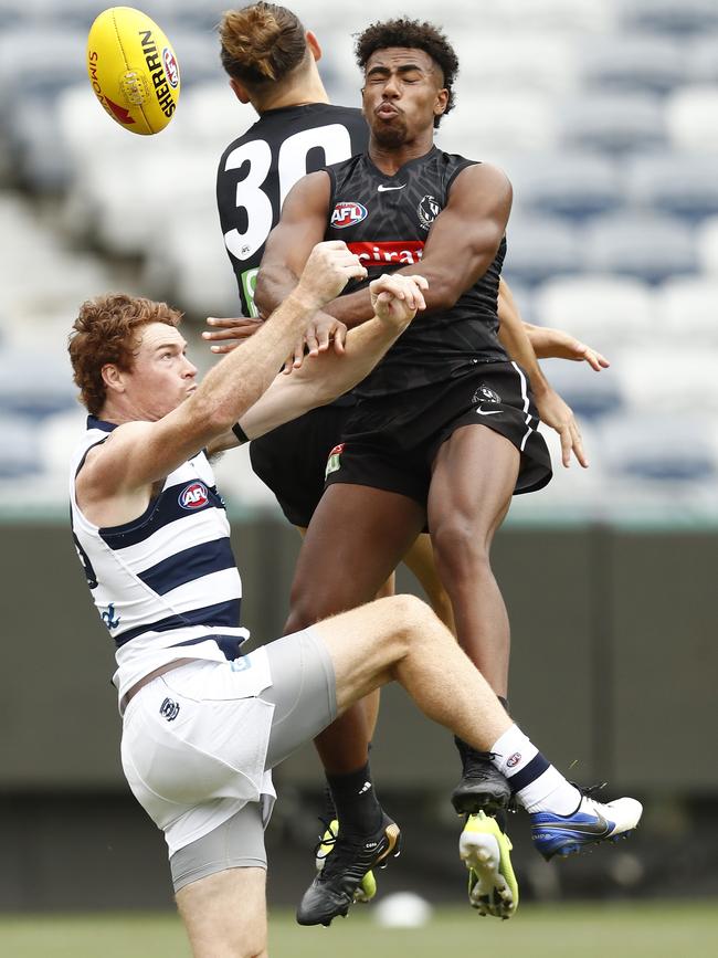 Quaynor spoils Geelong’s Gary Rohan during last weekend’s practice match. Picture: Darrian Traynor/Getty Images