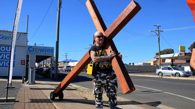 LONG WALK: Kevin 'Mad Dog' Mudford has been walking with his crucifix throughout Australia and New Zealand  for nearly 40 years. Picture: Matt Collins