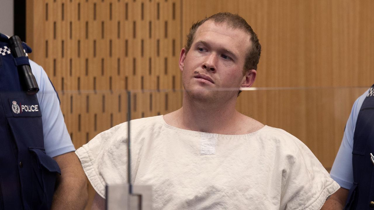 FILE - In this March 16, 2019, file photo, Brenton Tarrant, the man charged in the Christchurch mosque shootings, appears in the Christchurch District Court, in Christchurch, New Zealand. The man accused of killing 51 people at two Christchurch mosques on Friday, June 14, 2019, pleaded not guilty to all the charges filed against him. (AP Photo/Mark Mitchell, Pool, File)