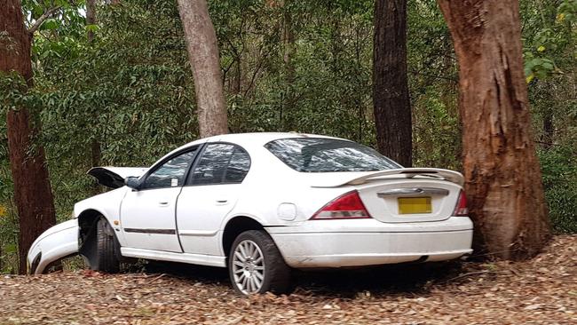 A crashed car at 'Devil's Elbow'.