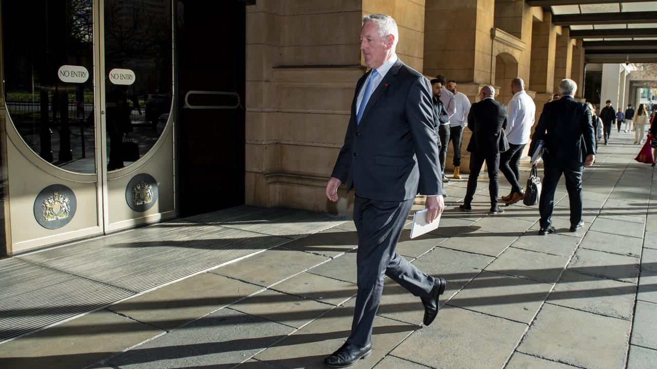 Mount Gambier MP Troy Bell arrives at the Sir Samuel Way building on Monday for the start of his trial. Picture: Mark Brake