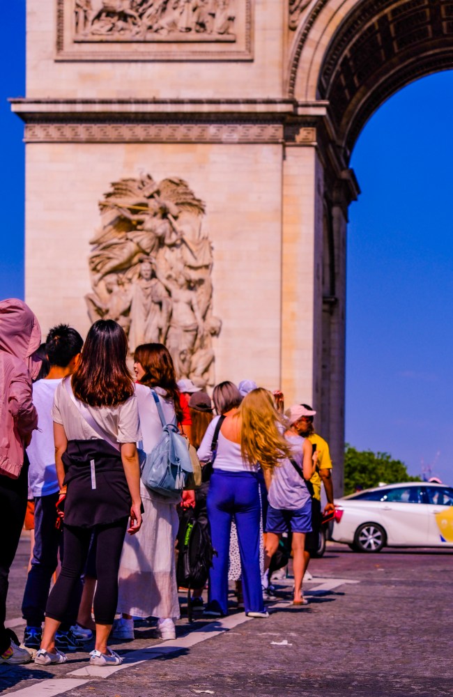 Tourists form a queue in the middle of the road. Picture: James Weir /news.com.au.