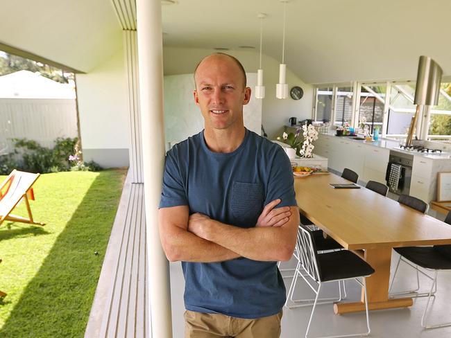 20/9/16:  Darren Lockyer, at his Paul Owen-designed home in Rosalie, Brisbane. Looking out from  kitchen dinning area of  the beautifully designed home encompasses new and old design features along with a number of open courtyards. Lyndon Mechielsen/The Australian