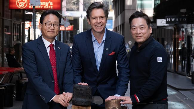 Republic of Korea’s Victorian Consulate-General Changhoon Yi, Melbourne lord mayor Nick Reece and Miracle Ventures Group CEO Hong Kim in the city’s newly designated Koreatown.