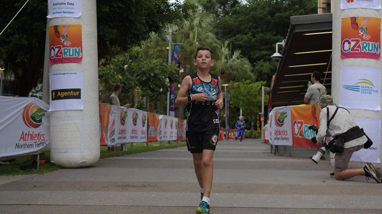 Tyson Williams finishes the Australia Day 2023 fun run at Darwin Waterfront. Picture: (A)manda Parkinson