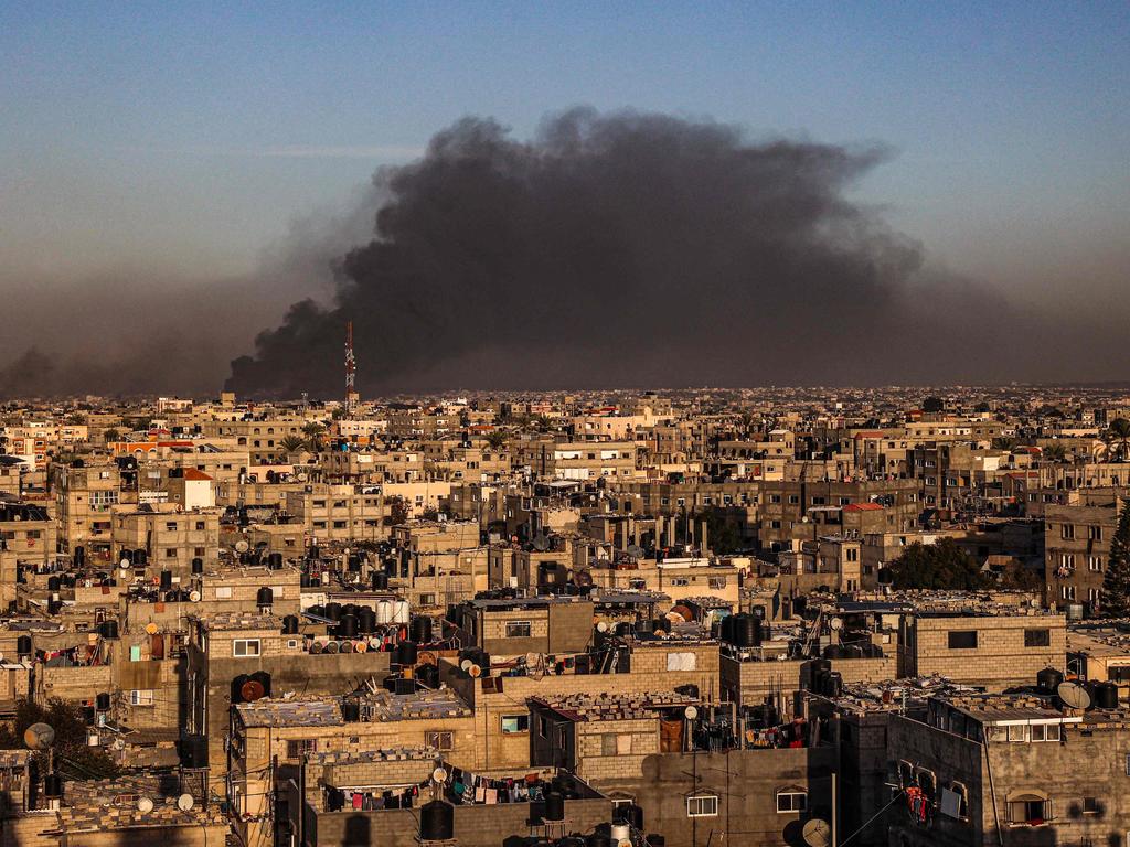 Smoke billows over Khan Yunis in the southern Gaza Strip during Israeli bombardment, amid ongoing battles between Israel and the Palestinian militant group Hamas. Picture: AFP