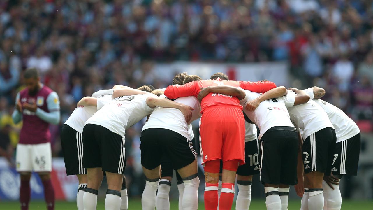 The Fulham team create a huddle prior to the Sky Bet Championship Play Off Final.