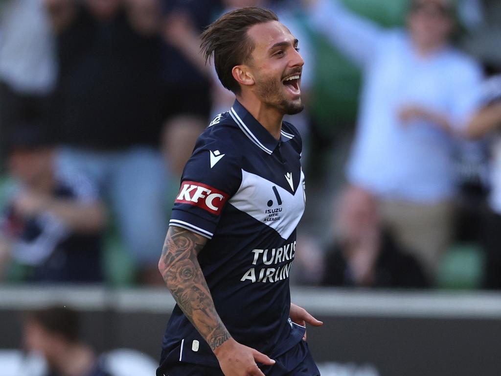 Reno Piscopo celebrates a goal for Victory in November.