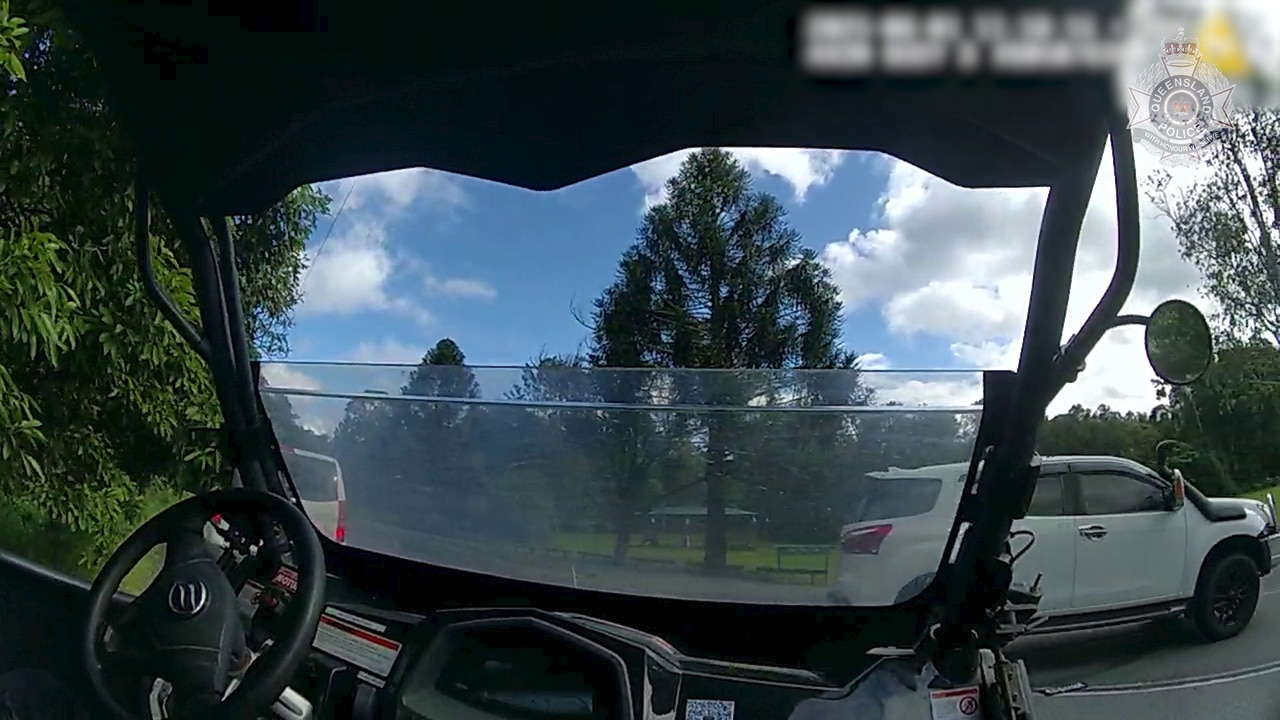 Body worn camera footage shows white Isuzu MUX ramming into the ATV of two police officers, who were later sent to the hospital for their injuries.