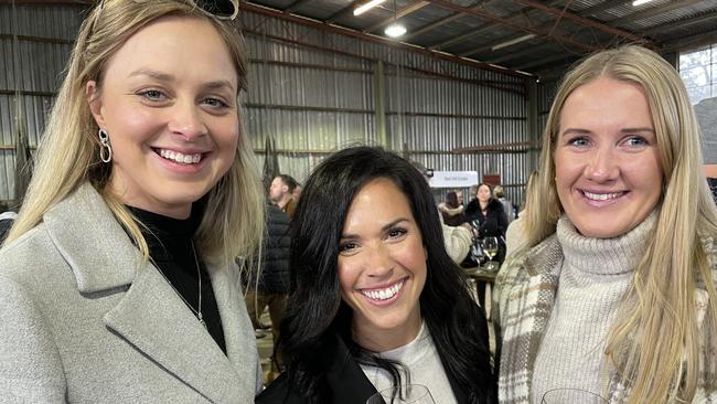 Introducing some of Victoria’s best wines to Tassie friend Sheridan Deane (middle) were Mornington Peninsula locals Laura Mazurek (left) and Brooke Howarth (right). Picture: Lucy Callander