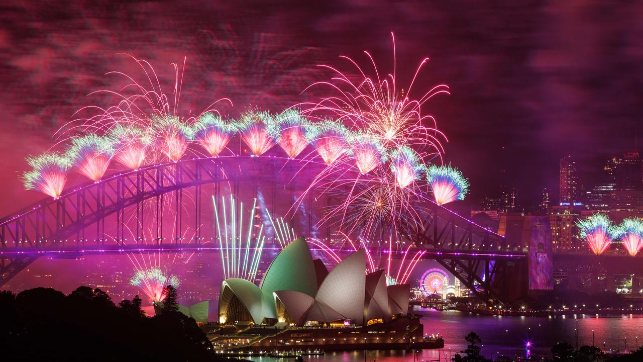 Fireworks light up the night sky to welcome in 2025, from Potts Point, Sydney. Picture: Justin Lloyd