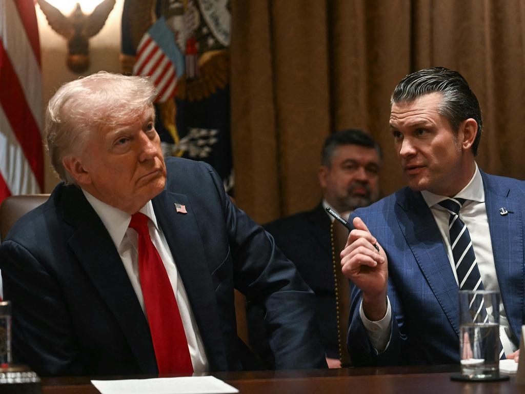 US President Donald Trump looks on as Secretary of Defense Pete Hegseth speaks during a cabinet meeting at the White House in Washington, DC. Picture: AFP