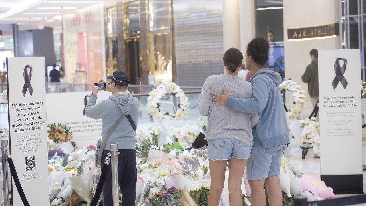 Tributes flow as shoppers return to Westfield shopping centre in Bondi Junction a week after the stabbing attakc. Picture: NCA NewsWire / Jeremy Piper