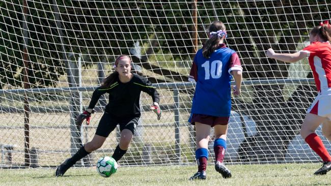 Brisbane Valley goalkeeper Alicjia Sajkar prepares for Blackstone attacking raid in the under 15/16 years grand final. Picture: Gary Reid