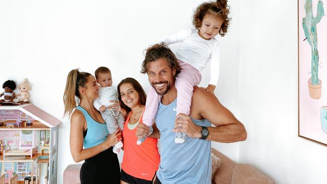 Sam Wood, his wife Snezana and daughters Charlie, Eve and Willow are working out at home. Picture: Supplied