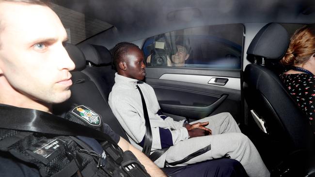 A man arrives at the Brisbane Watchhouse in relation to the murder of Girum Mekonnen at Zillmere. Picture: Tara Croser.