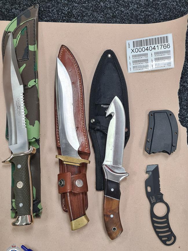 Guns, knives, drugs and cash were seized. Supplied NSW Police