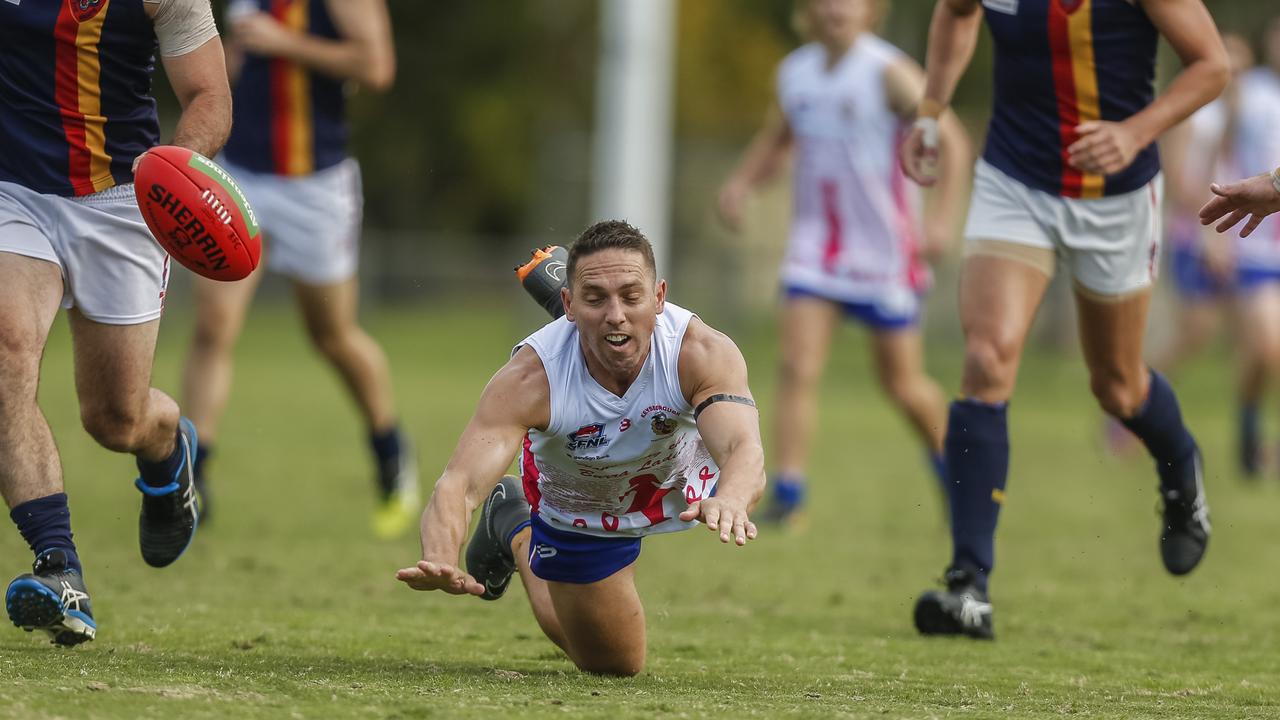 Southern: Keysborough’s Ryan Goodes can’t keep his feet against Caulfield. Picture: Valeriu Campan