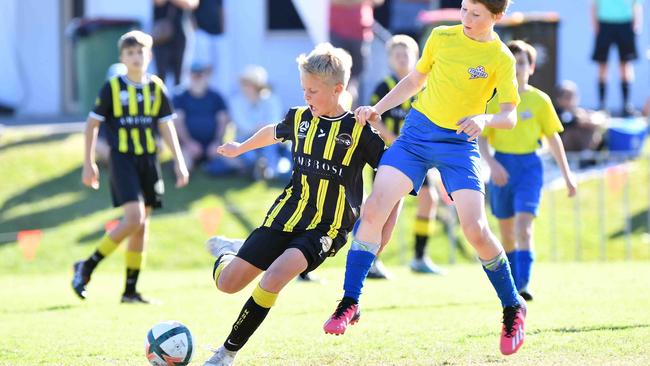 SOCCER: Junior football carnival, Maroochydore. Moreton Bay United V Strikers, U12 boys. Picture: Patrick Woods.