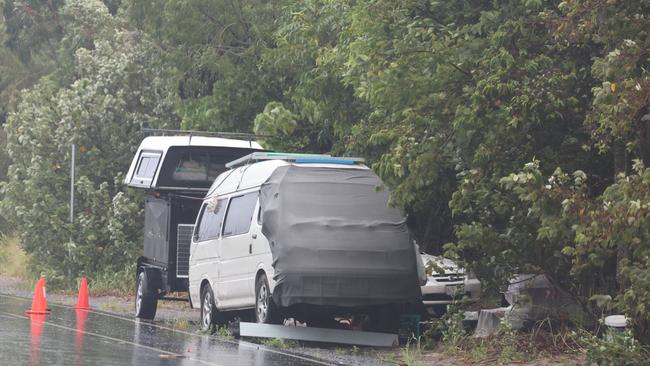 Vehicles attempt to shelter in the bush at The Spit from the weather. Picture: Glenn Hampson.