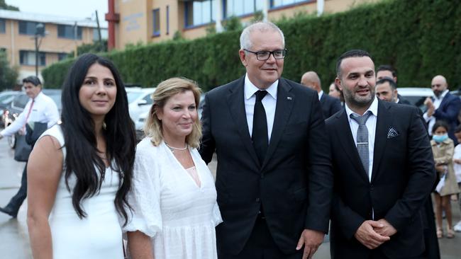 Danny and Leila Abdallah with Scott and Jenny Morrison after the one-year anniversary of the heartbreaking loss of their four young relatives at a mass. Picture: Damian Shaw