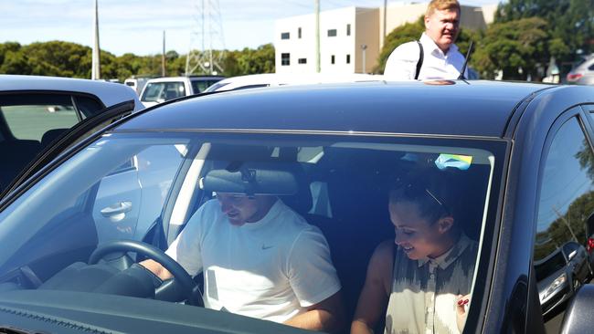 Daly Cherry-Evans, his wife, Vessa, and manager, Gavin Orr (rear) leave Crounlla Leagues Club after talks with the Sharks in 2015. Picture: Brett Costello