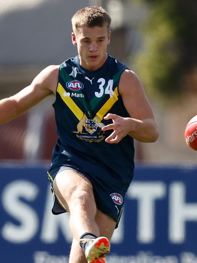 Sam Lalor of the AFL Academy kicks the ball during the 2024 AFL Academy match.