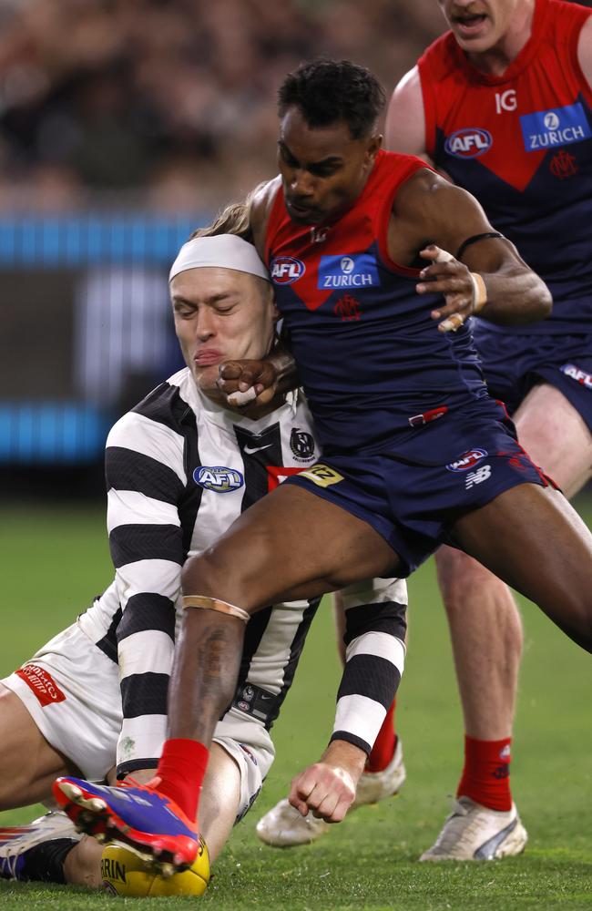 Kysaiah Pickett bumps Darcy Moore on Friday night. Picture: Darrian Traynor/Getty Images