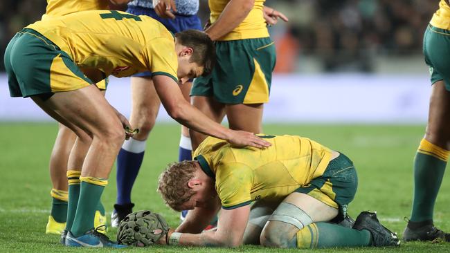 David Pocock in pain after being the victim of a neck roll in the second Bledisloe Cup Test against the All Blacks in Auckland last year. Picture: AAP  