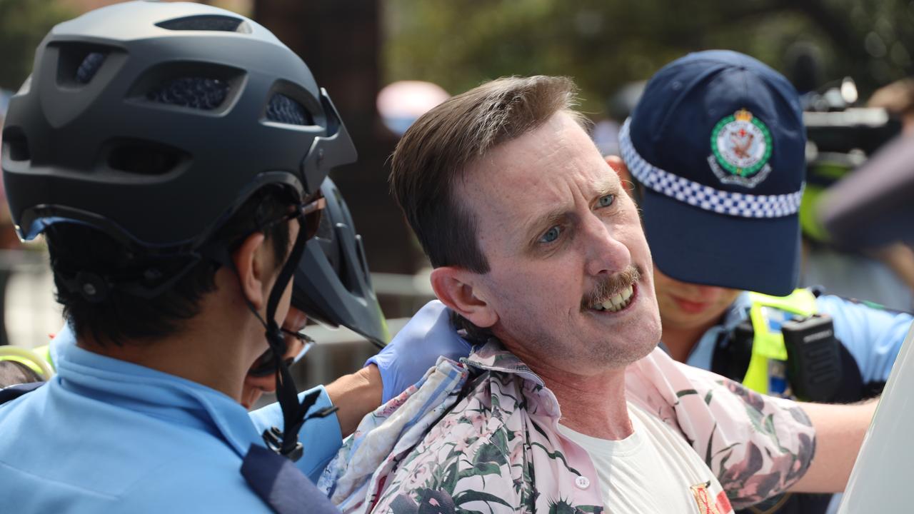 A man is dragged away by police. Picture: NCA NewsWire / Nicholas Eagar