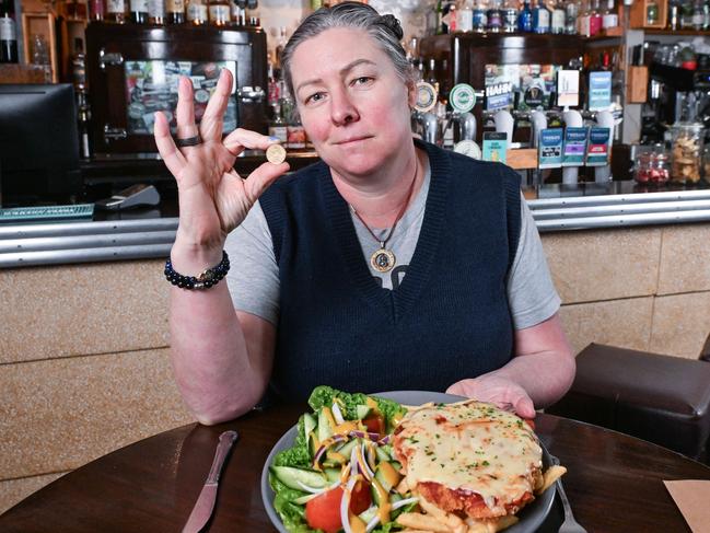 SEPTEMBER 27, 2024: Duke of Brunswick owner Simone Douglas with a $33.50 chicken schnitzel with salad, with each one sold making just a $2 profit. Picture: Brenton Edwards