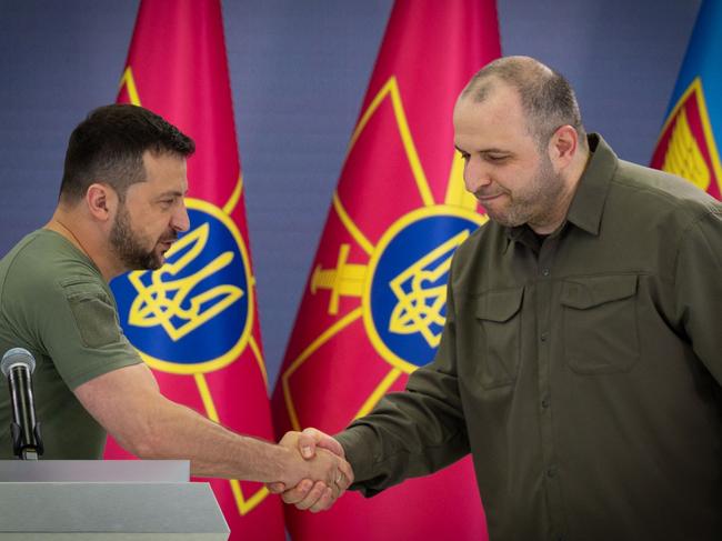 President of Ukraine Volodymyr Zelenskyy (left) shakes hands with newly appointed Minister of Defense Rustem Umerov. Picture: Handout / Ukrainian Presidential Press Service / AFP