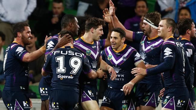 Storm players celebrate a Suliasi Vunivalu try against the Rabbitohs at AAMI Park. Picture: Getty Images