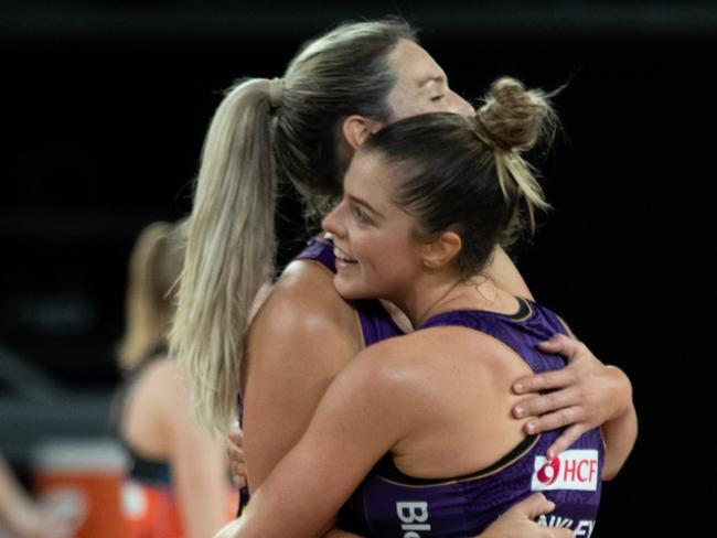 MELBOURNE, AUSTRALIA - JULY 04: Gretel Bueta and Lara Dunkley of the Firebirds celebrate after the game during the round nine Super Netball match between Queensland Firebirds and the Giants at John Cain Arena, on July 04, 2021, in Melbourne, Australia. (Photo by Mackenzie Sweetnam/Getty Images)