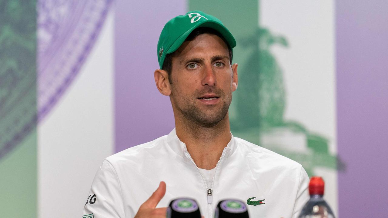 Serbia's Novak Djokovic attends a press conference after winning his men's singles final match against Italy's Matteo Berrettini.