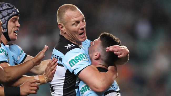 Cronulla's Luke Lewis celebrates a try scored by Cronulla's Chad Townsend during the NRL Semi Final match between the Cronulla Sharks and Penrith Panthers at Allianz Stadium, Sydney. Picture: Brett Costello