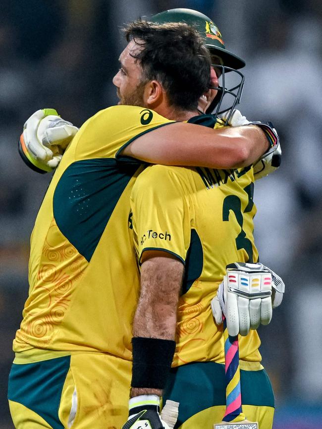 What a partnership. (Photo by INDRANIL MUKHERJEE / AFP)