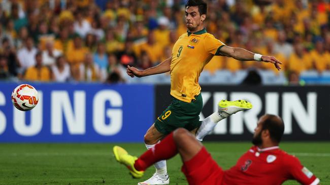 Tomi Juric runs clear to score Australia's fourth goal.